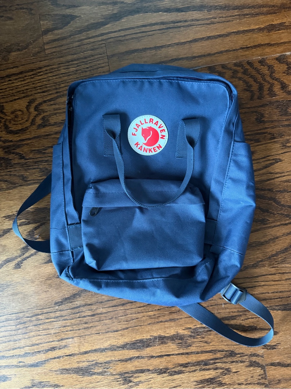 Fjallraven Kånken Backpack in Navy Blue with Red Logo